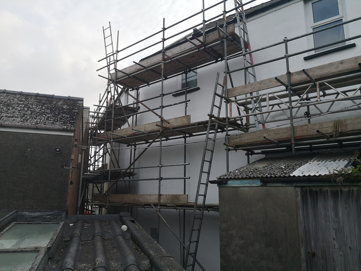 Exterior rendering work with scaffolding in place